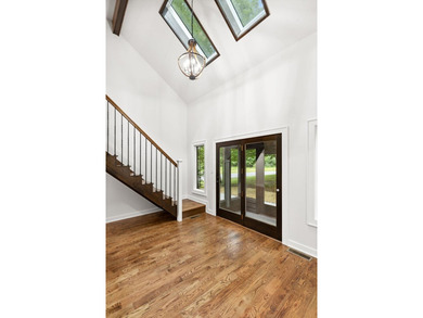 Beautifully renovated lakefront contemporary home, complete with - photo 4