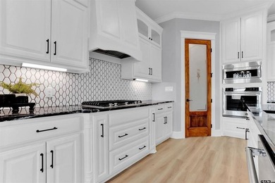 Welcome to this spacious, modern luxury home tucked away on a - photo 17