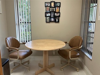 Discover this delightful first-floor unit in the sought-after - photo 12