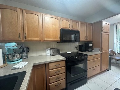 Discover this delightful first-floor unit in the sought-after - photo 17