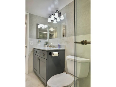 Discover this delightful first-floor unit in the sought-after - photo 18