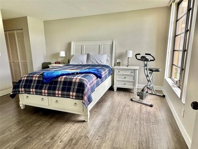 Discover this delightful first-floor unit in the sought-after - photo 22