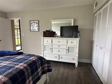 Discover this delightful first-floor unit in the sought-after - photo 24