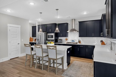 Welcome to this beautifully upgraded home located on one of the - photo 16