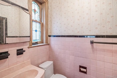 Welcome to 1404 E 49th Street, a semi-detached brick one-family - photo 18