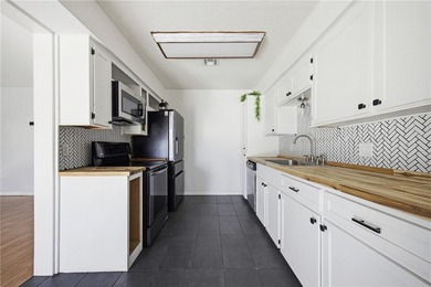 Welcome to this beautifully maintained 4-bedroom, 2-bath, 1-car - photo 7