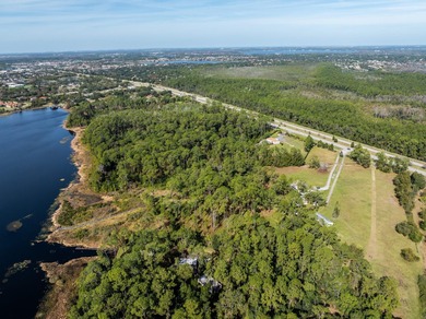 Privately positioned on Lake Mabel, this rare lakefront offering - photo 13