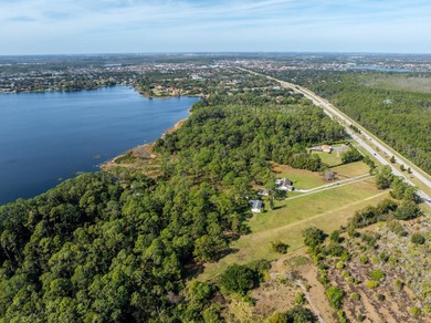 Privately positioned on Lake Mabel, this rare lakefront offering - photo 14