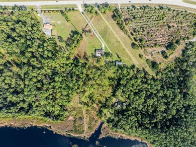 Privately positioned on Lake Mabel, this rare lakefront offering - photo 18