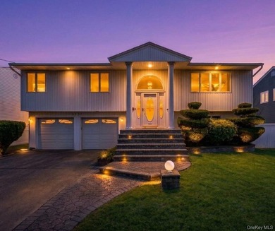 Waterfront high ranch offering 4 bedrooms and 2 full baths, set - photo 1
