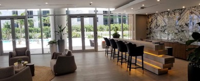 Welcome to Aria on the Bay--a soaring masterpiece of modern