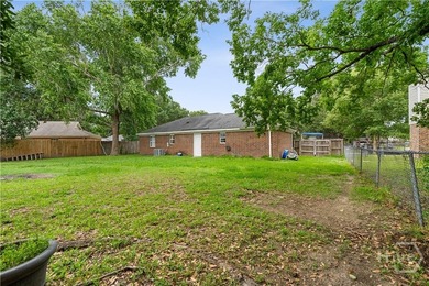 Welcome home to this spacious 4-bedroom, 2-bath ranch located in - photo 25