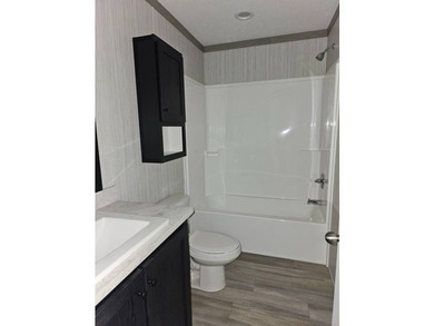 Discover affordable new home living at Tall Oaks #7, a charming - photo 4
