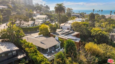 Located in the coveted Santa Monica Canyon, this reimagined - photo 2