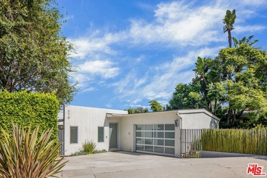 Located in the coveted Santa Monica Canyon, this reimagined - photo 3
