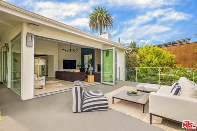 Located in the coveted Santa Monica Canyon, this reimagined - photo 8