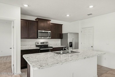 Welcome home! This 3-bedroom home sits on the Indian River - photo 9