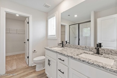 The Camden is a thoughtfully designed two-story home featuring - photo 12