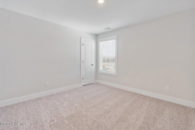 The Camden is a thoughtfully designed two-story home featuring - photo 15