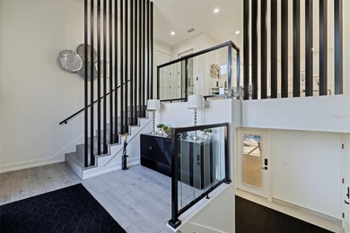 This exceptional waterfront residence, built in 2023, delivers a