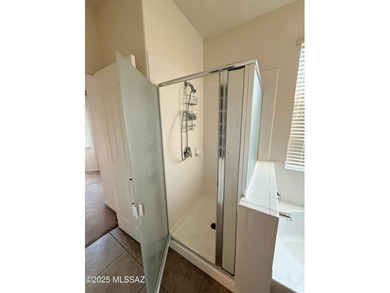 Spacious three bedroom, two bath home with cozy fireplace in