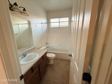 Spacious three bedroom, two bath home with cozy fireplace in