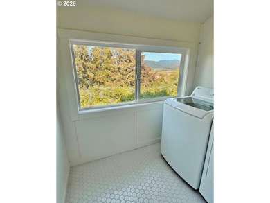 Perched above charming downtown Nehalem, this remodeled coastal - photo 19