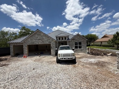 Spectacular views of the golf course from this new 3/2.5/3 home - photo 2