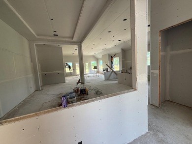 Spectacular views of the golf course from this new 3/2.5/3 home - photo 3