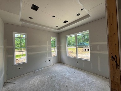 Spectacular views of the golf course from this new 3/2.5/3 home - photo 4