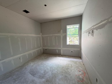Spectacular views of the golf course from this new 3/2.5/3 home - photo 9
