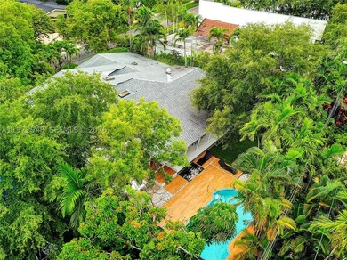 Located in Bay Heights, this 4-bedroom, 4.5-bath residence - photo 7