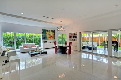 Located in Bay Heights, this 4-bedroom, 4.5-bath residence - photo 8