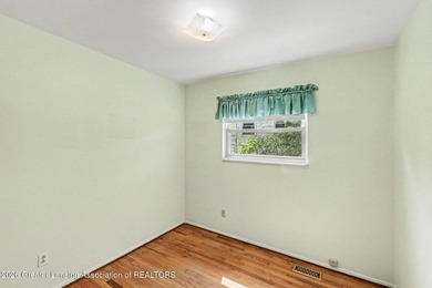 Tucked into East Lansing's beloved Pinecrest neighborhood, this - photo 12
