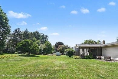 Tucked into East Lansing's beloved Pinecrest neighborhood, this - photo 16