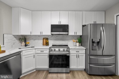 Welcome to 6947 Mayfair Terrace. Renovated Top to Bottom in the - photo 12