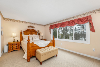 Winnipesaukee home with shared beach, day dock moorings and boat - photo 18