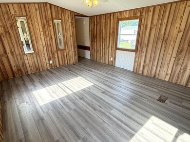 Affordable living situated within a quiet park in Madison. One - photo 3
