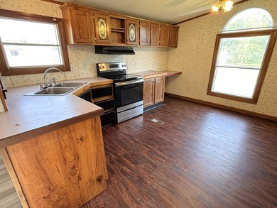 Affordable living situated within a quiet park in Madison. One - photo 7