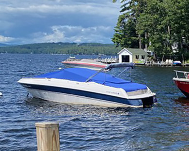 Winnipesaukee home with shared beach, day dock moorings and boat - photo 5