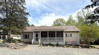 LAKE HOUSE- LIKE NEW -WITH DEEP WATER SHARED DOCK--MOVE-IN - photo 3