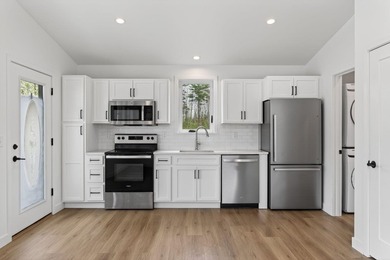 Turnkey cottage at The Cottages at Simplicity Court -- one of - photo 8