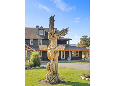 Set on 4.8 level acres w manicured lawns, this remarkable - photo 18