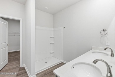 The Retreat plan offers a well-designed single-story layout with - photo 6