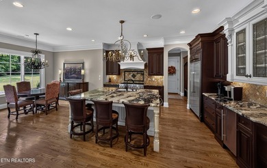 This beautiful stone-and-brick Tuscan-inspired home in the gated - photo 16