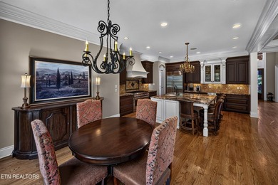 This beautiful stone-and-brick Tuscan-inspired home in the gated - photo 19