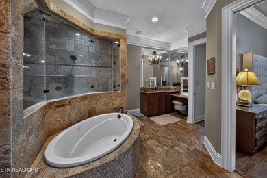 This beautiful stone-and-brick Tuscan-inspired home in the gated - photo 22