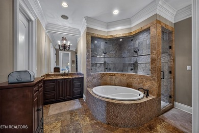 This beautiful stone-and-brick Tuscan-inspired home in the gated - photo 23