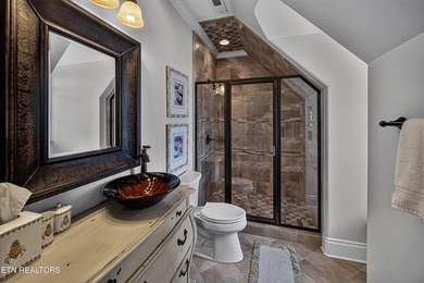 This beautiful stone-and-brick Tuscan-inspired home in the gated - photo 26