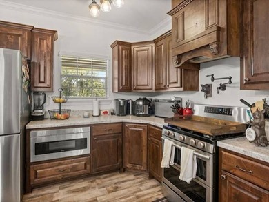 Lake Living at Its Finest! Discover this stunning 4-bedroom - photo 6
